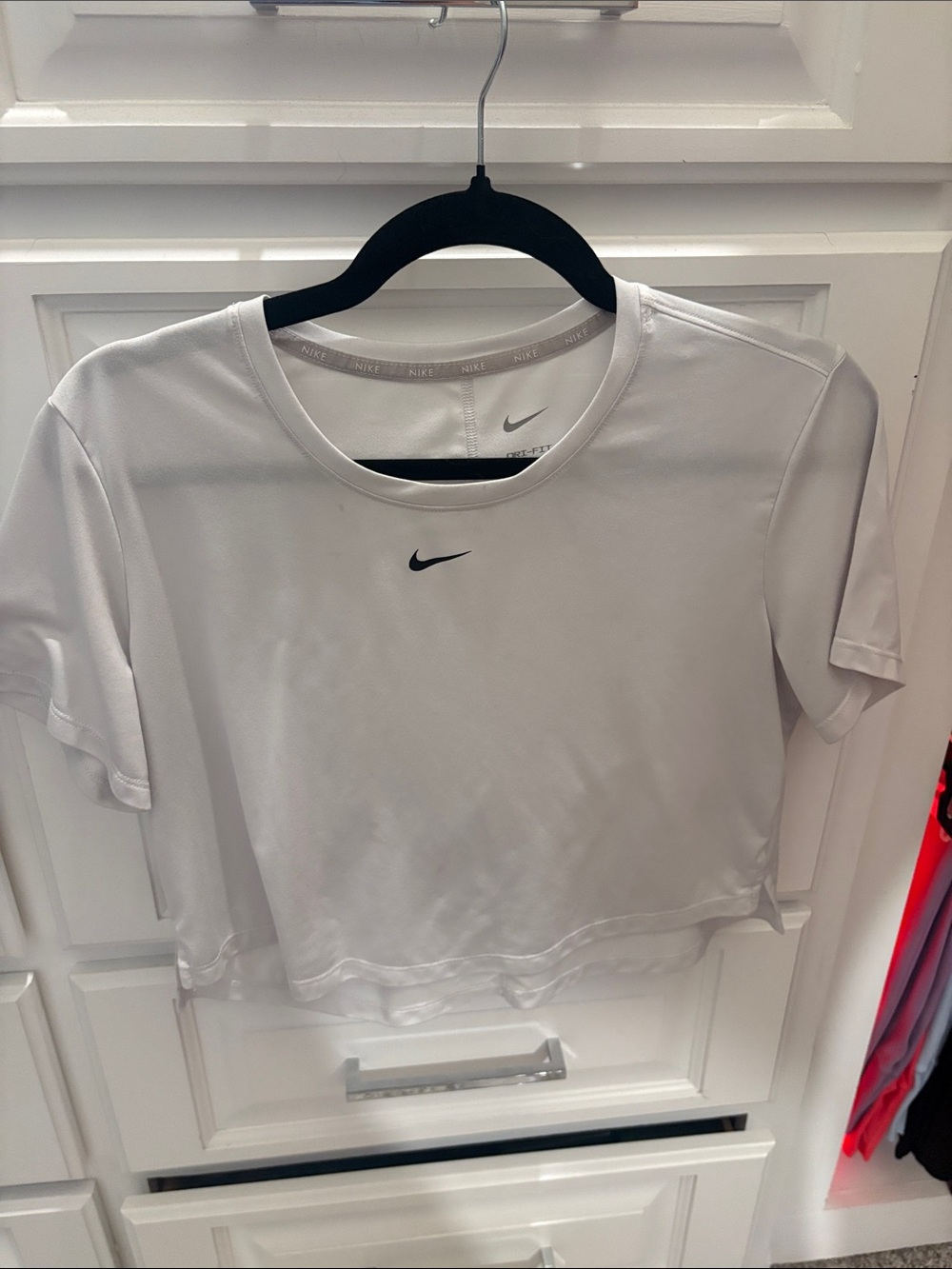 Nike White Cropped Dri-FIT Tee with Black Swoosh